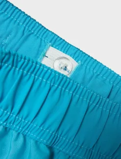 NMMMCCOY POKEMON LONG SWIMSHORTS SKY - Badbyxa