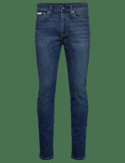 SLIM TAPER OIL SLICK JEAN - Slim jeans